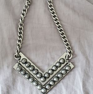 Silver chunky double arrow with clasp closure